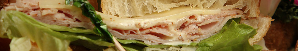 Eating Sandwich at Pavement Coffeehouse - Berklee restaurant in Boston, MA.
